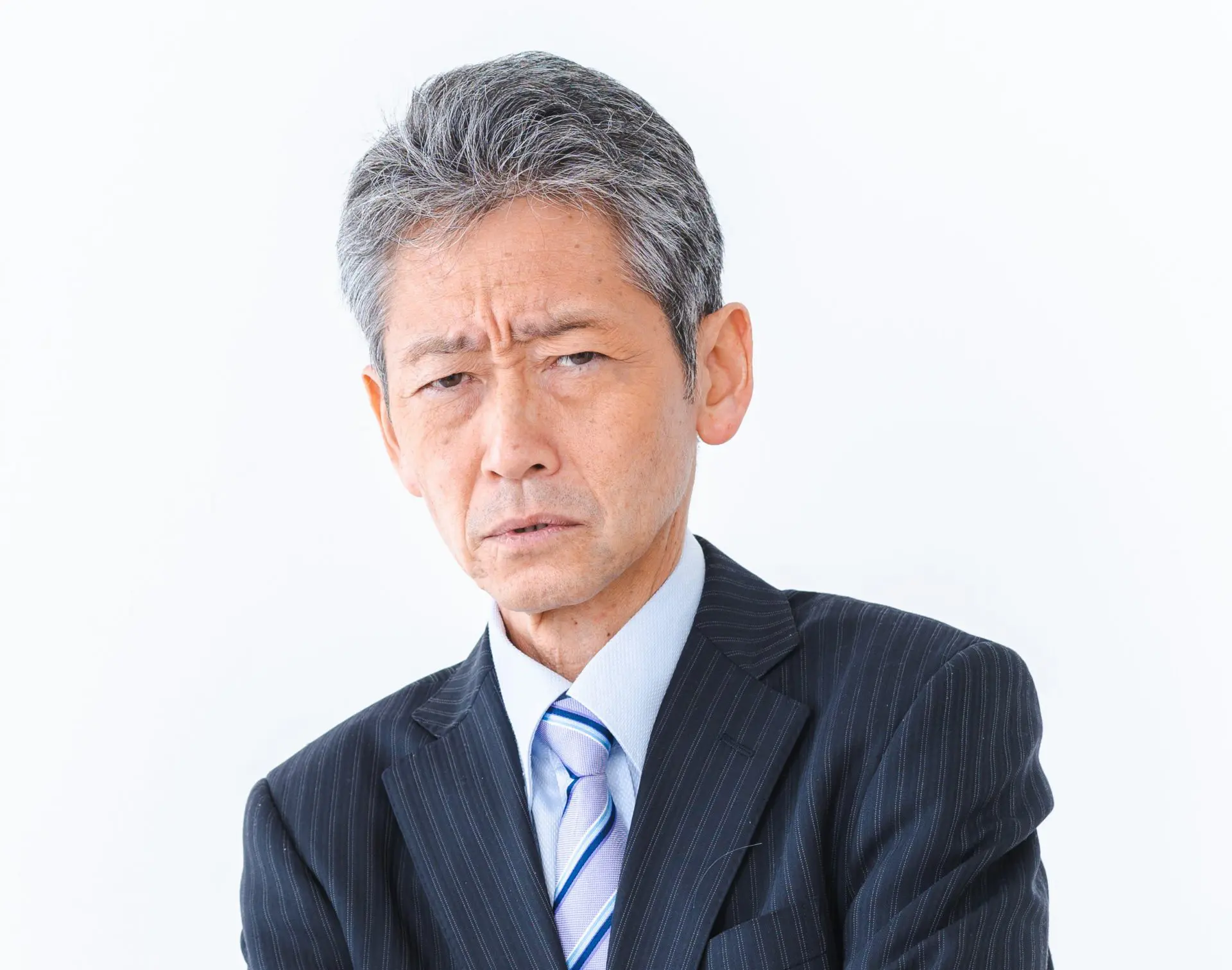 困った顔の経営者